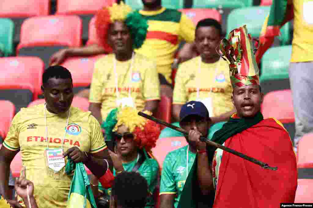 Ethiopian football supporters cheer in the stands ahead of the Group A Africa Cup of Nations (CAN) 2021 football match between Cameroon and Ethiopia.