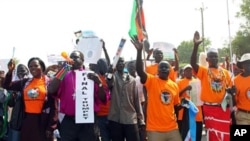 Southern Sudanese citizens clog the streets of the southern capital Juba, as they march in support of the independence referendum, to be held one month from today, 09 Dec. 2010