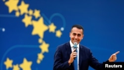 Italian Deputy PM Luigi Di Maio speaks at the 5-Star Movement party's open-air rally at Circo Massimo in Rome, Italy, Oct. 21, 2018.