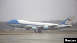 Air Force One lands with U.S. President Barack Obama and his family at Joint Base Andrews, Maryland, Jan. 2, 2017.