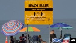 Virus Outbreak Florida Beaches Reopen