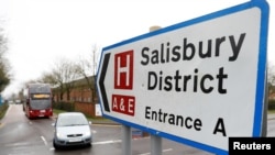 FILE - A sign towards Salisbury District Hospital is seen after Yulia Skripal was discharged, in Salisbury, Britain, April 10, 2018. 
