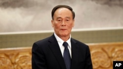 FILE - Wang Qishan is head of the Communist Party’s Central Commission for Discipline Inspection, a graft-busting entity.