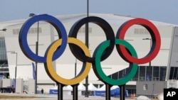 FILE - Olympic rings are seen in front of Gangneung Hockey Center in Gangneung, South Korea, April 4, 2017. 