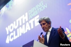 FILE - John Kerry, U.S. special presidential envoy for climate, holds a news conference during the pre-COP26 climate meeting in Milan, Italy, Oct. 2, 2021.