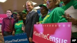 New York Attorney General Eric Schneiderman stands with members of District Council 37 after a news conference in New York, April 3, 2018. Schneiderman announced a new lawsuit by 17 states, the District of Columbia and six cities against the U.S. government Tuesday, saying a plan to add a citizenship demand to the census questionnaire is unconstitutional.