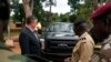 The U.S. Ambassador to Central African Republic Jeffrey Hawkins and the Central African Republic's deputy chief of staff for planning, Lieutenant Colonel Ishmael Koagu, check out a trucks being provided by the U.S. government to the C.A.R. army. (Z. Bad