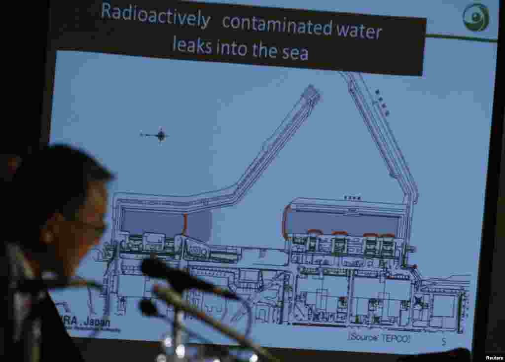 Japan&#39;s Nuclear Regulation Authority Chairman Shunichi Tanaka is seen in front of a screen showing the current situation of the contaminated water leakage at Fukushima Daiichi, Sept. 2, 2013.