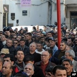 People are seen during a demonstration in Tunis, Tunisia, against high prices and unemployment, 08 Jan 2011.