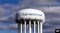 The Flint Water Plant water tower is seen in Flint, Michigan, March 21, 2016. Researchers from Virginia Tech say the lead levels in the city's drinking water is decreasing. 