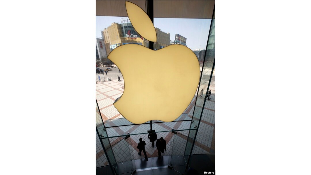 FILE - Apple Inc's logo is seen at its Apple store in Beijing, China.