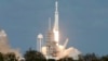 SpaceX's Big New Rocket Blasts Off, Puts Sports Car in Space