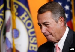 House Speaker John Boehner of Ohio leaves a news conference on Capitol Hill in Washington, Sept. 25, 2015.