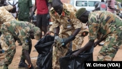 Soldiers cleaning up the streets of Juba, Oct. 27, 2018.