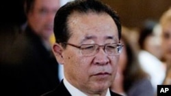 Kim Kye Gwan, first vice foreign minister of North Korea, arrives at John F. Kennedy International Airport in New York, July 26, 2011