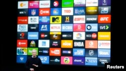 FILE - Apple CEO Tim Cook speaks about the Apple TV during an event at Apple headquarters in Cupertino, California, March 21, 2016. 