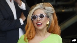 In this May 16, 2012, file photo, Lady Gaga arrives at the Sungshan airport in Taipei, Taiwan.