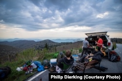 Blue Ridge Parkway users enjoying food and beautiful scenery from the many viewpoints along the road.