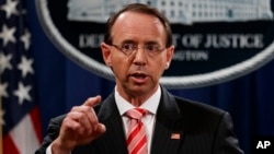 Deputy Attorney General Rod Rosenstein speaks during a news conference at the Department of Justice, July 13, 2018.