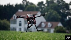 FILE - A drone is shown at a farm and winery in Cordova, Maryland, June 11, 2015.