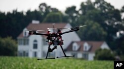 FILE - A drone is shown during a demonstration flight. 