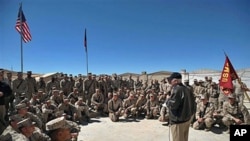 US Defense Secretary Robert Gates speaks to US Marines during his visit to the 3rd Battalion, 5th Marine Regiment at Forward Operating Base Sabit Qadam in Afghanistan's Helmand province, March 8, 2011