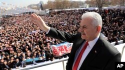 Turkey's Prime Minister and the leader of ruling Justice and Development Party Binali Yildirim addresses a rally in Ankara, Turkey, Feb. 25, 2017.