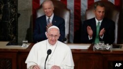 Pope Francis addresses a joint meeting of Congress on Capitol Hill in Washington, Sept. 24, 2015, making history as the first pontiff to do so. 