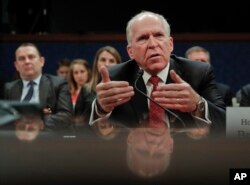 FILE - Former CIA Director John Brennan testifies on Capitol Hill in Washington, May 23, 2017, before the House Intelligence Committee Russia Investigation Task Force.