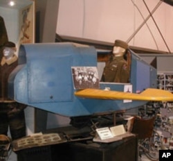 The U.S. Army Air Force used a crude simulator, bolted to a platform that bounced and shook, to train pilots during World War II. This one is preserved in a museum.