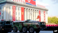 Missiles are on display during a military parade October 10, 2015, during celebrations to mark the 70th anniversary of North Korea's Workers' Party. 