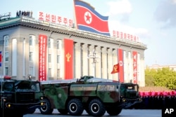 FILE - Missiles on display during a military parade in North Korea, Oct. 10, 2015.