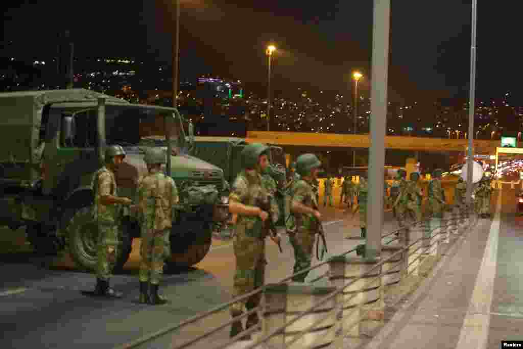 Turkish military block access to the Bosphorus bridge, which links the city's European and Asian sides, in Istanbul, Turkey, July 15, 2016. 