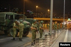 Turkish military block access to the Bosphorus bridge, which links the city's European and Asian sides, in Istanbul, Turkey, July 15, 2016.