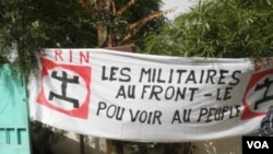 Sign at a demonstration against the coup d'etat, held on March 26 in Bamako, Mali. The sign reads, 'Military to the front lines, power to the people'.