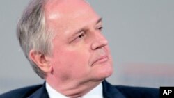 FILE - Paul Polman, CEO of Unilever, attends the Business And Climate summit, May 20, 2015, in Paris.