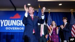 Virginia Governor-elect Glenn Youngkin arrives to speak at an election night party in Chantilly, Va., early Nov. 3, 2021, after defeating Democrat Terry McAuliffe.