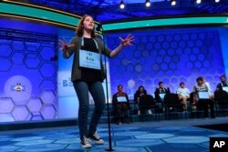 Erin Howard, 14, of Huntsville, Ala., gets excited after receiving her last word to spell as she competes in the finals of the 2019 Scripps National Spelling Bee in Oxon Hill, Md., May 30, 2019.