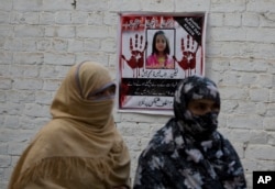 Posters reading "protest," pasted at walls of a neighborhood of Zainab in Kasur, Jan. 18, 2018. The rape and murder of the young girl sparked deadly clashes between protesters and police.