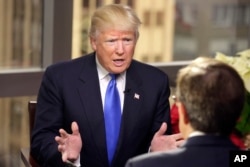 FILE - President-elect Donald Trump is interviewed by Chris Wallace of "Fox News Sunday" at Trump Tower in New York, Dec. 10, 2016.