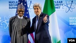 Secretary of State John Kerry meets with Nigerian President Muhammadu Buhari at the Nuclear Security Summit, Thursday, March 31, 2016, at the Walter E. Washington Convention Center in Washington. (AP Photo/Andrew Harnik)
