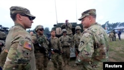 U.S. Army Europe commander Ben Hodges speaks to soldiers during the final day of NATO Saber Strike exercises in Orzysz, Poland, June 16, 2017.