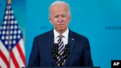 President Joe Biden delivers an update on the COVID-19 response and vaccination program, in the South Court Auditorium on the White House campus, Oct. 14, 2021.