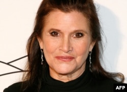 FILE - Carrie Fisher is pictured at the 2011 Silver Hill Hospital gala at Cipriani 42nd Street, in New York City, Nov. 3, 2011. The actor best known for her portrayal of Princess Leia in the "Star Wars" films died Tuesday, days after suffering a heart attack on a transatlantic flight.