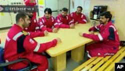 In this photo released by state-run IRIB News Agency, which aired on Monday, July 22, 2019, shows various crew members of the British-flagged tanker Stena Impero, that was seized by Tehran in the Strait of Hormuz on Friday.