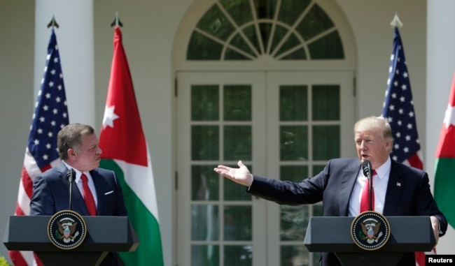 U.S. President Donald Trump, right, and Jordan's King Abdullah II hold a joint news conference in the Rose Garden at the White House in Washington, April 5, 2017.