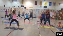 Teachers at Gunpowder Elementary school in Baltimore, MD, take part in a fitness class designed to reduce stress.