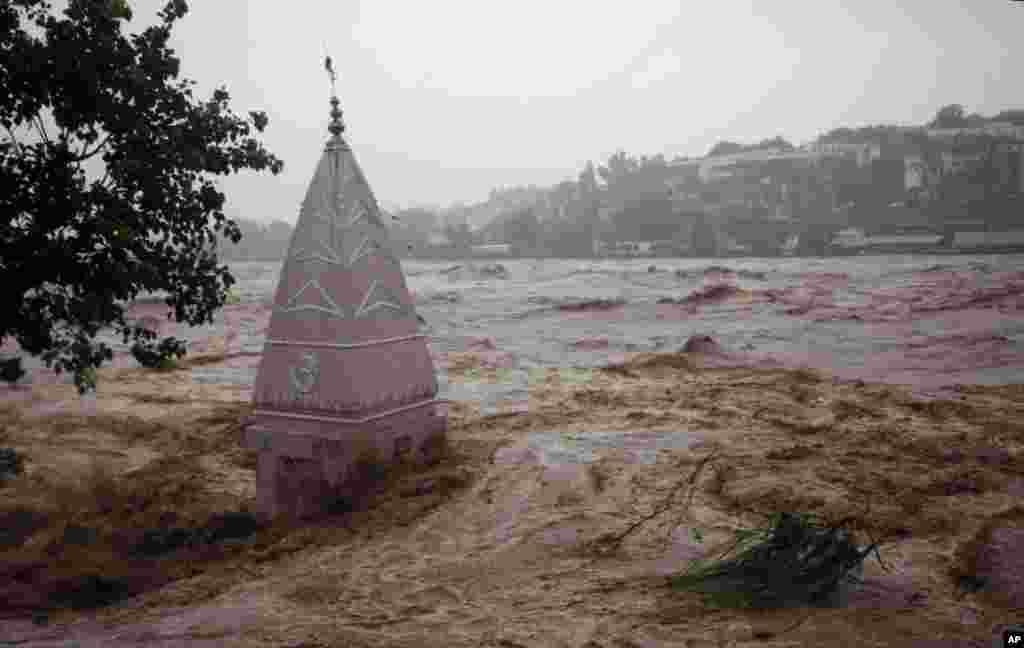 A temple is partially submerged in floodwaters in Jammu, India, Sept. 6, 2014.