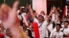 Supporters of Indonesian President Joko Widodo celebrate during a rally in Jakarta, Indonesia, April 21, 2019. 