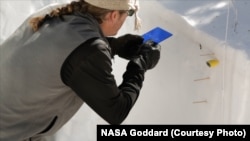 Researchers currently gather snow data the old-fashioned way - in the field.